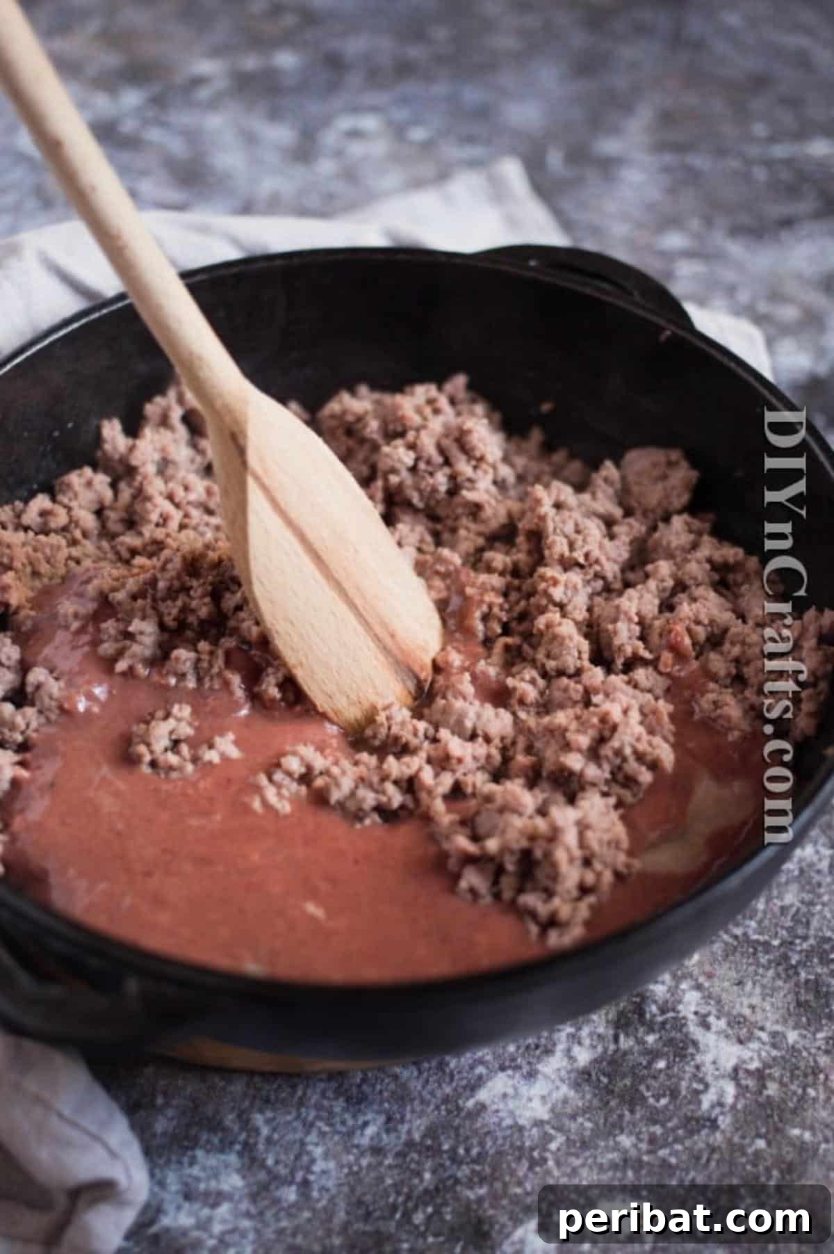Browning the minced meat in olive oil for bolognese