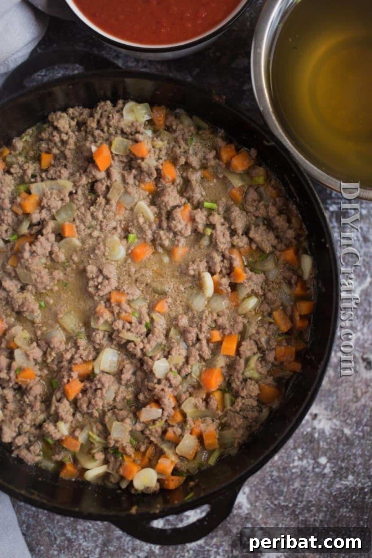 Mixing vegetables and meat for bolognese sauce