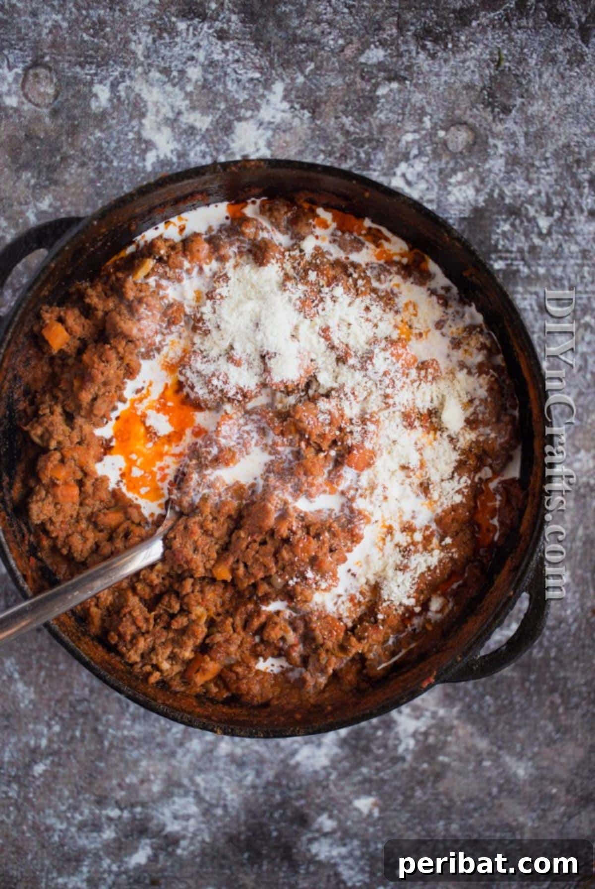 Gently stirring ingredients in the slow cooker for even cooking