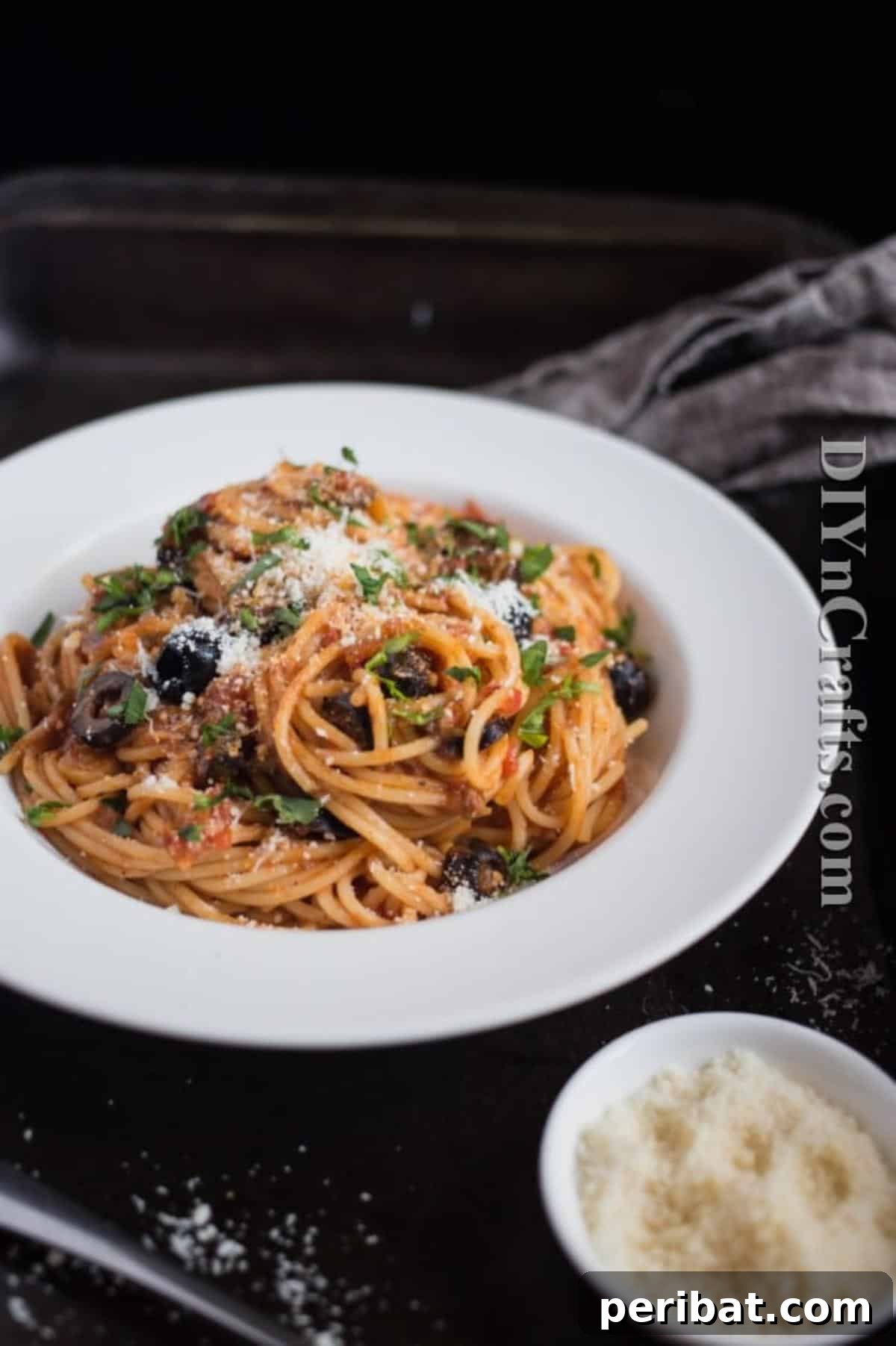 Spaghetti Puttanesca: Bold Flavors, Classic Appeal 8 Served finished spaghetti puttanesca.