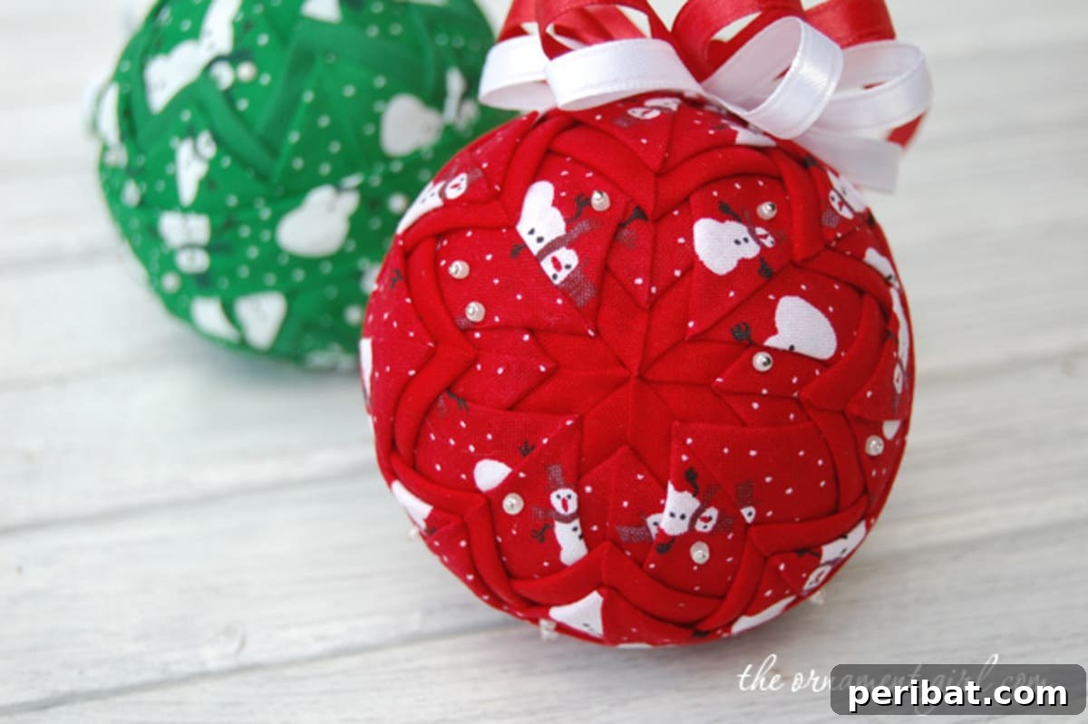 Strips of fabric added onto christmas ornaments.