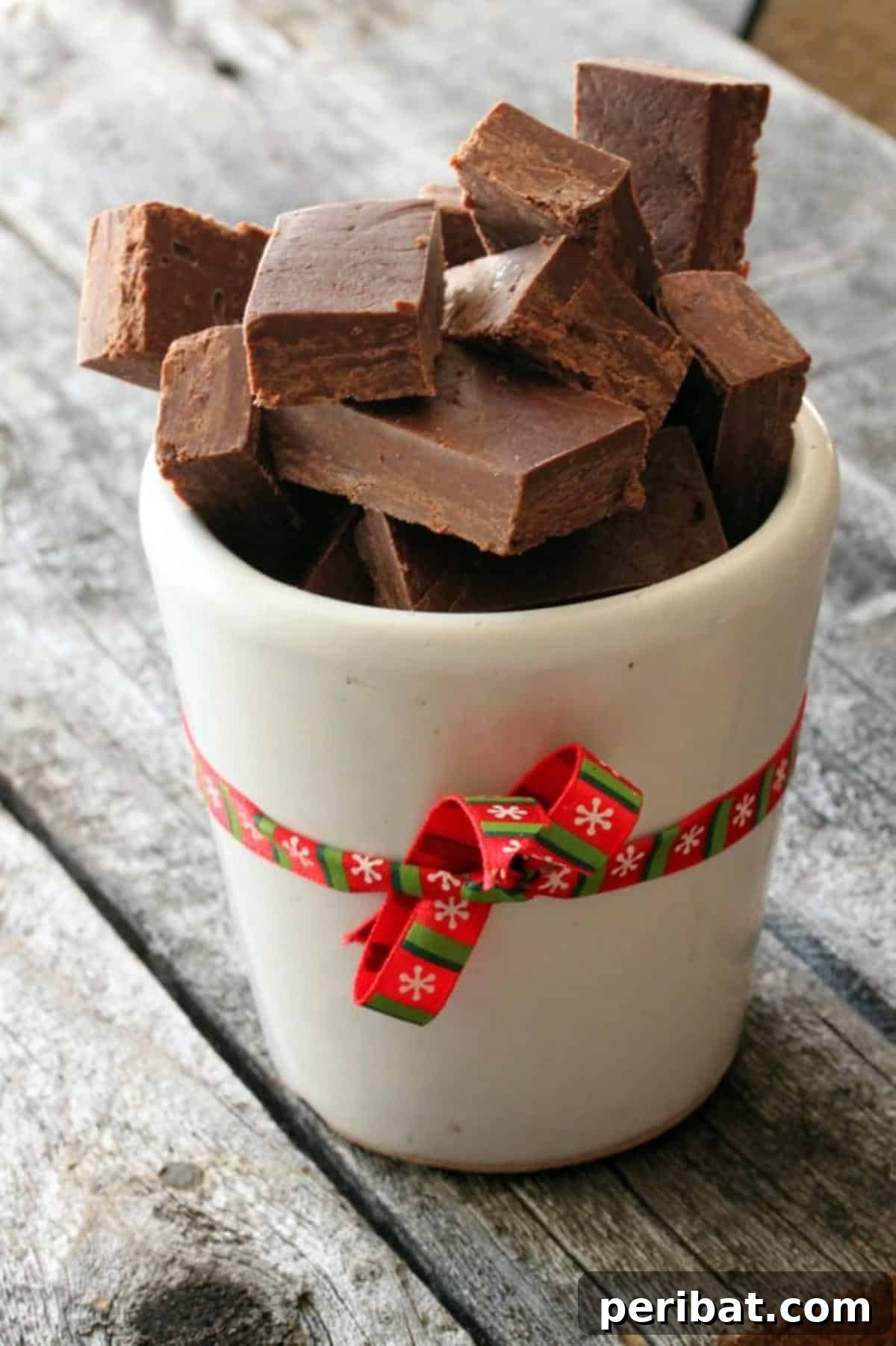 Rich, dark, traditional chocolate fudge cut into perfect squares.