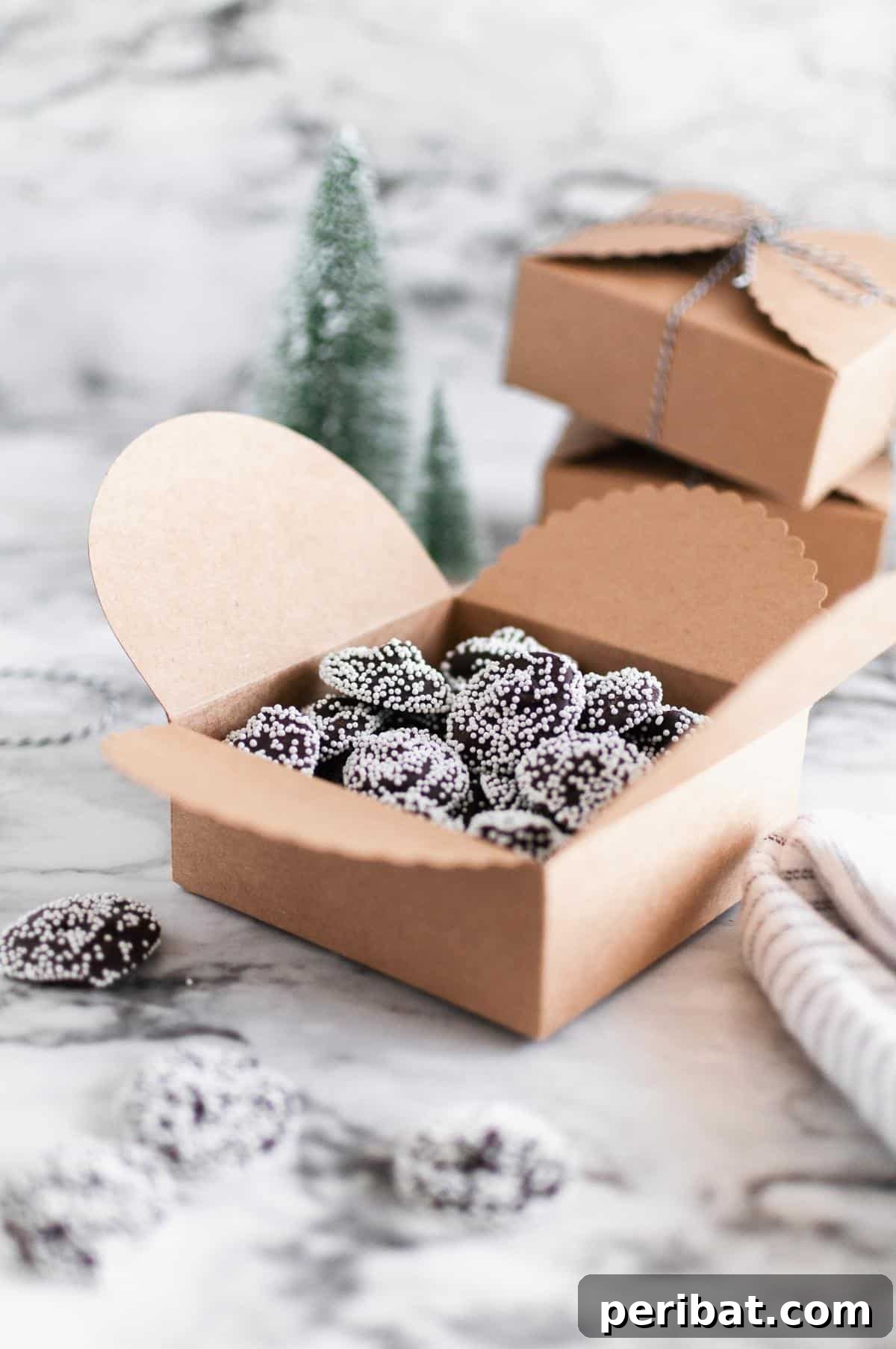 Homemade chocolate snowcaps with white sprinkles, resembling snowy peaks.