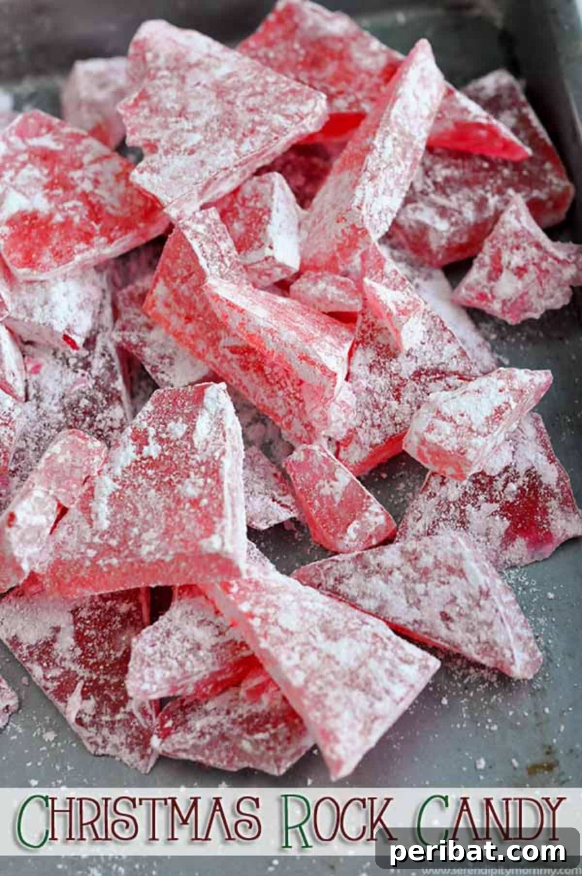 Assorted homemade hard candies in various festive colors and shapes, perfect for holiday treats.