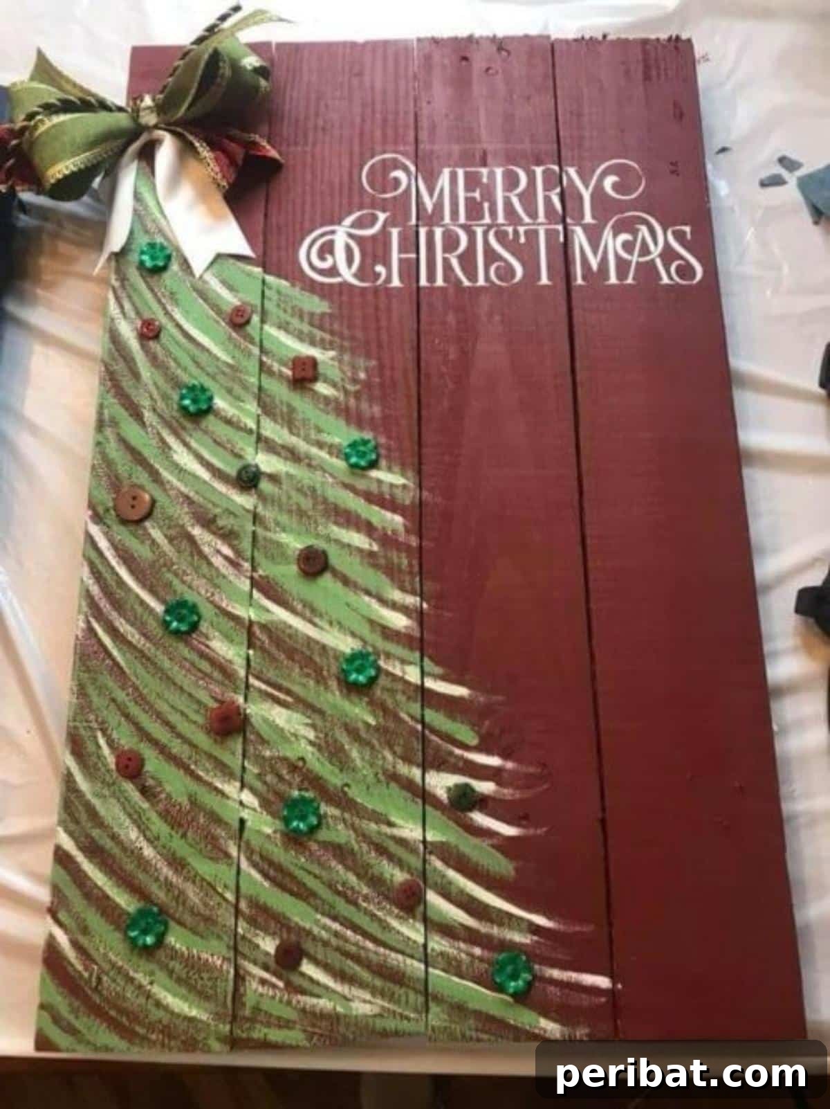 Handmade Holiday: 30+ Unique DIY Wooden Christmas Signs 12 Wooden Pallet Tree Sign