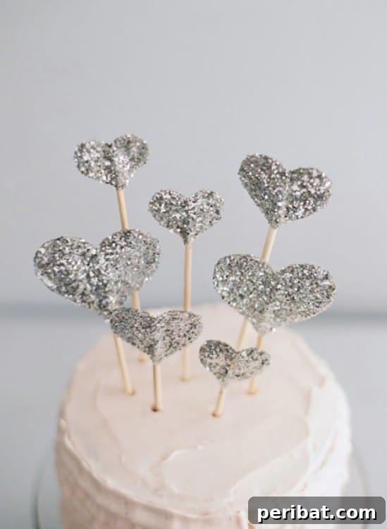 28 Effortless DIY Ideas for a Spectacular New Year's Eve Party 16 Glitter Heart Cake Topper - 28 Fun and Easy DIY New Year’s Eve Party Ideas