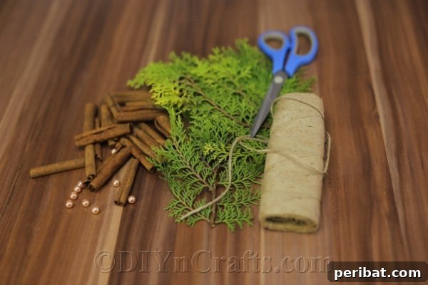 Infuse Your Tree with Rustic Aroma: DIY Ornaments 4 Gathering three graduated pine sprigs and a cinnamon stick for the DIY ornament base.