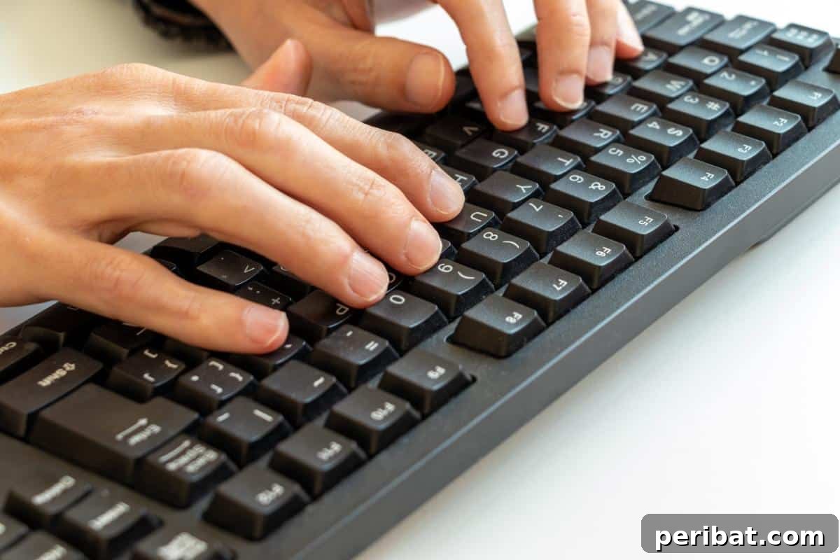 Master 28 Vital Life Skills in Days 9 Hands typing efficiently on a computer keyboard