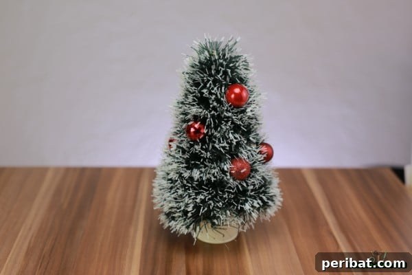 DIY Adorable Miniature Christmas Trees 14 Placing the finished tree onto a base