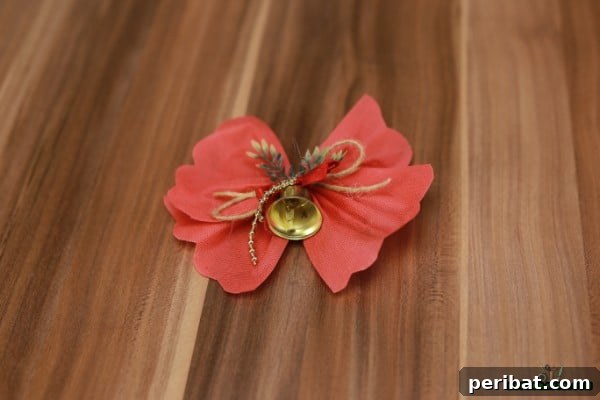 DIY Adorable Miniature Christmas Trees 18 The finished bow tree topper with a bell