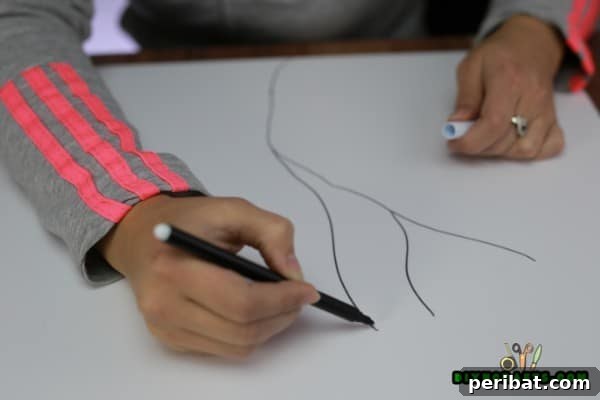From Snack to Showpiece Pistachio Shell Wall Art 4 Sketching tree on canvas with black marker