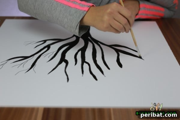 Painting tree branches on canvas