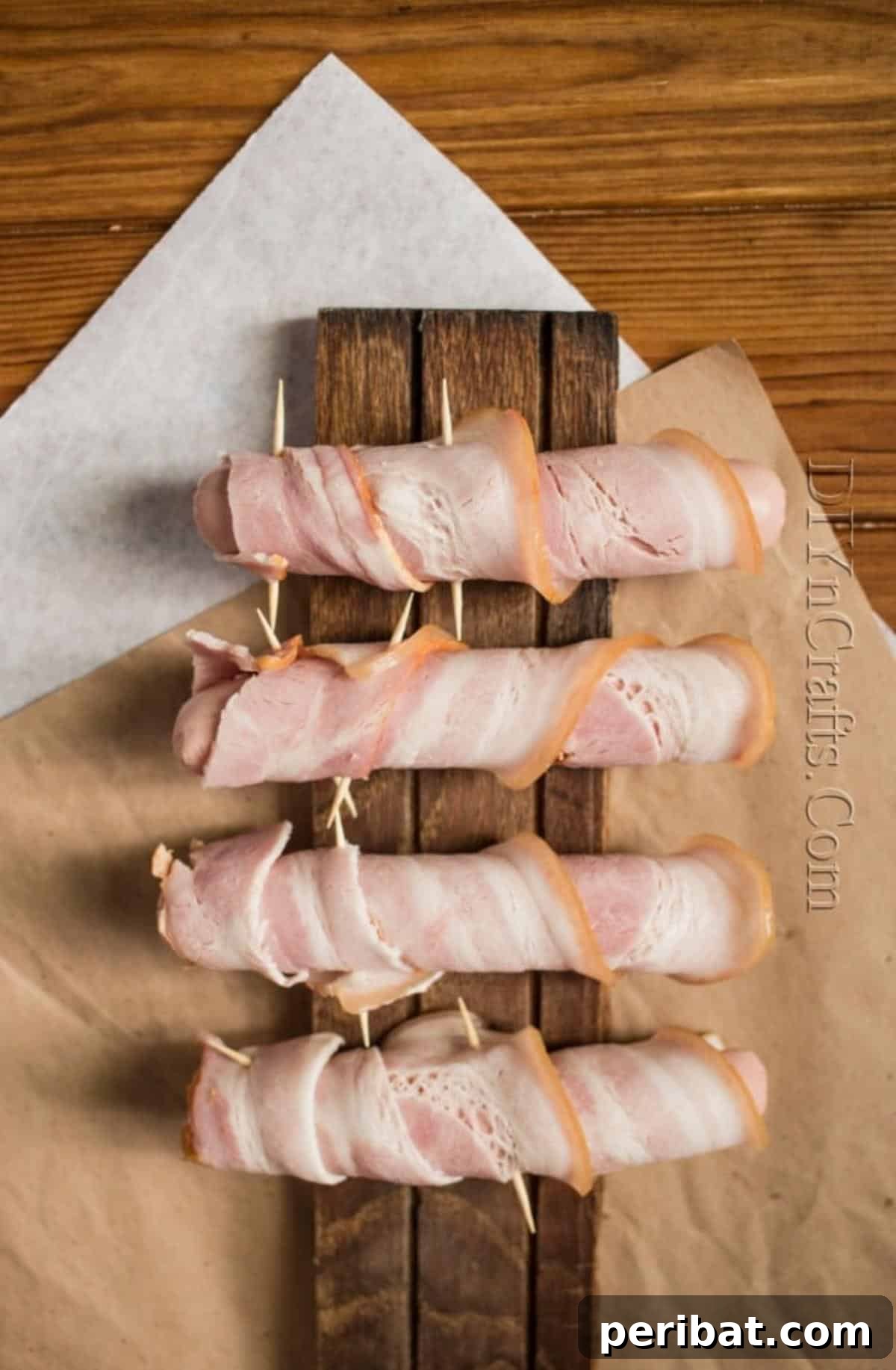 Bacon Wrapped Hot Dog Heaven 4 Expertly wrapping hot dogs with bacon strips, secured with toothpicks