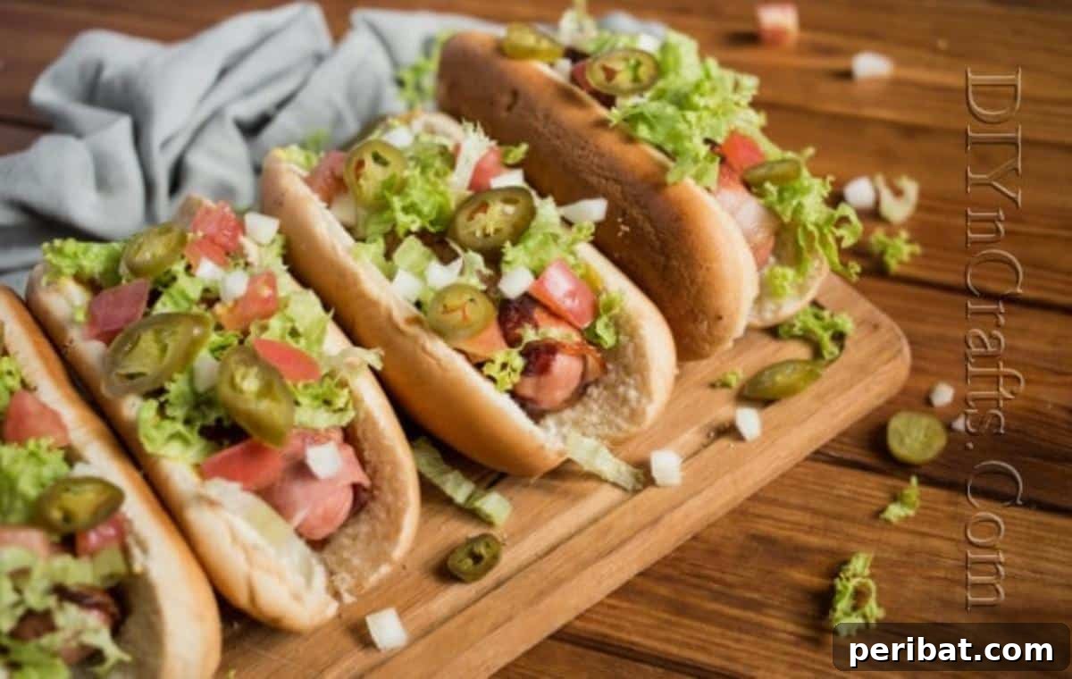 Bacon Wrapped Hot Dog Heaven 6 Two finished Bacon Wrapped Hot Dogs, beautifully topped and ready to eat