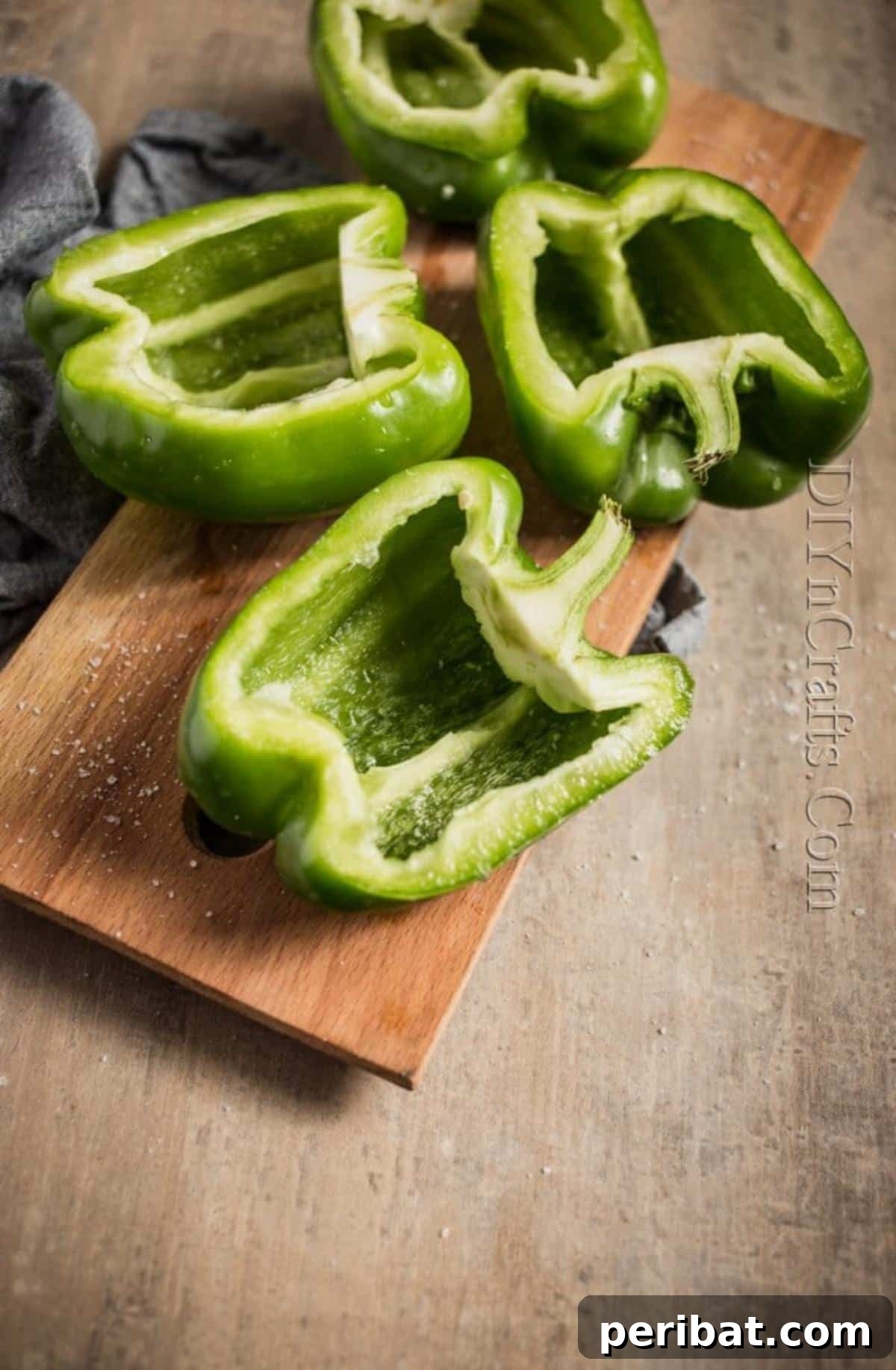 Golden Cheesy Mushroom Cauliflower Stuffed Peppers 4 Cutting bell peppers evenly in half.