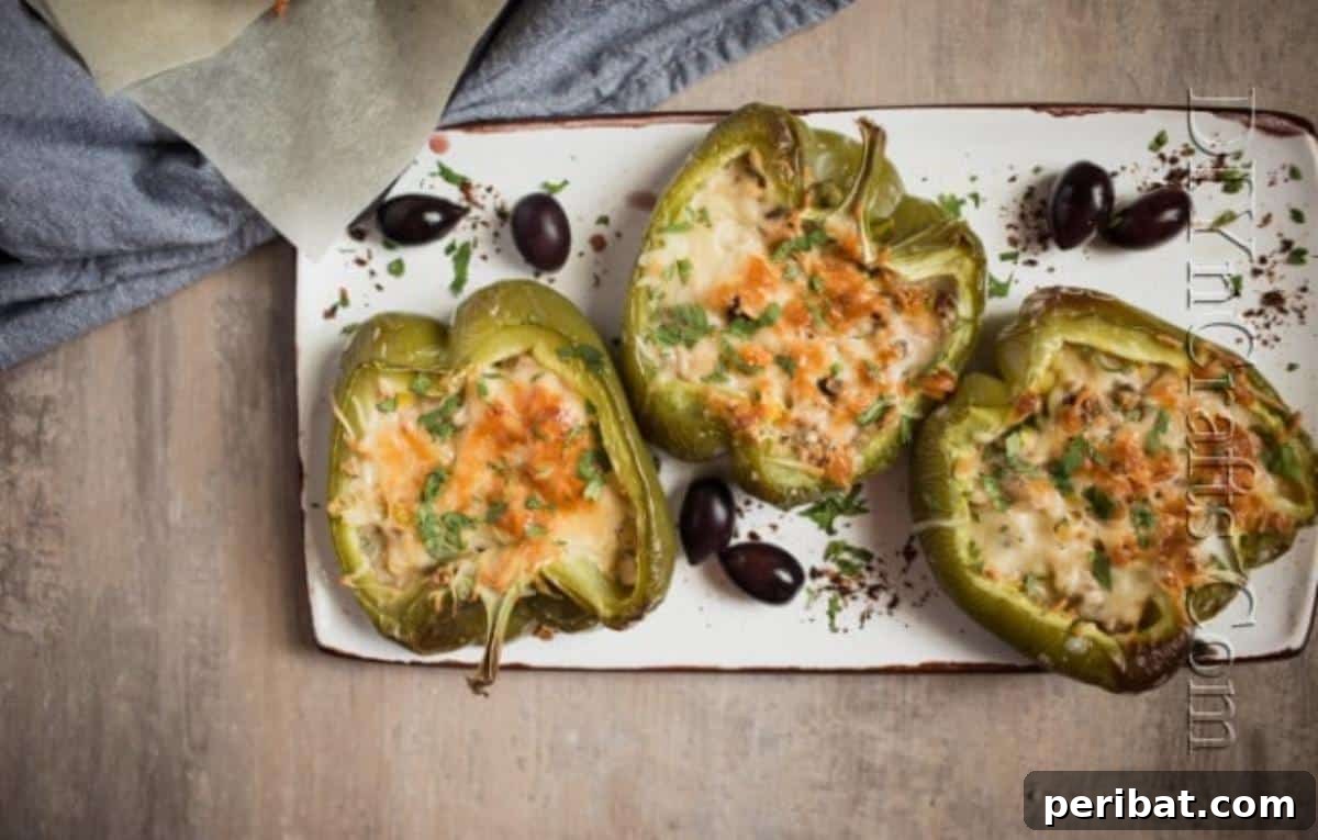 Golden Cheesy Mushroom Cauliflower Stuffed Peppers 7 Finished baked stuffed bell peppers.