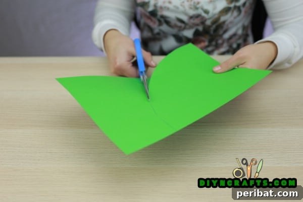 Miniature Cardstock Strip Christmas Tree Craft 7 Cutting the paper along the curved line for the cone