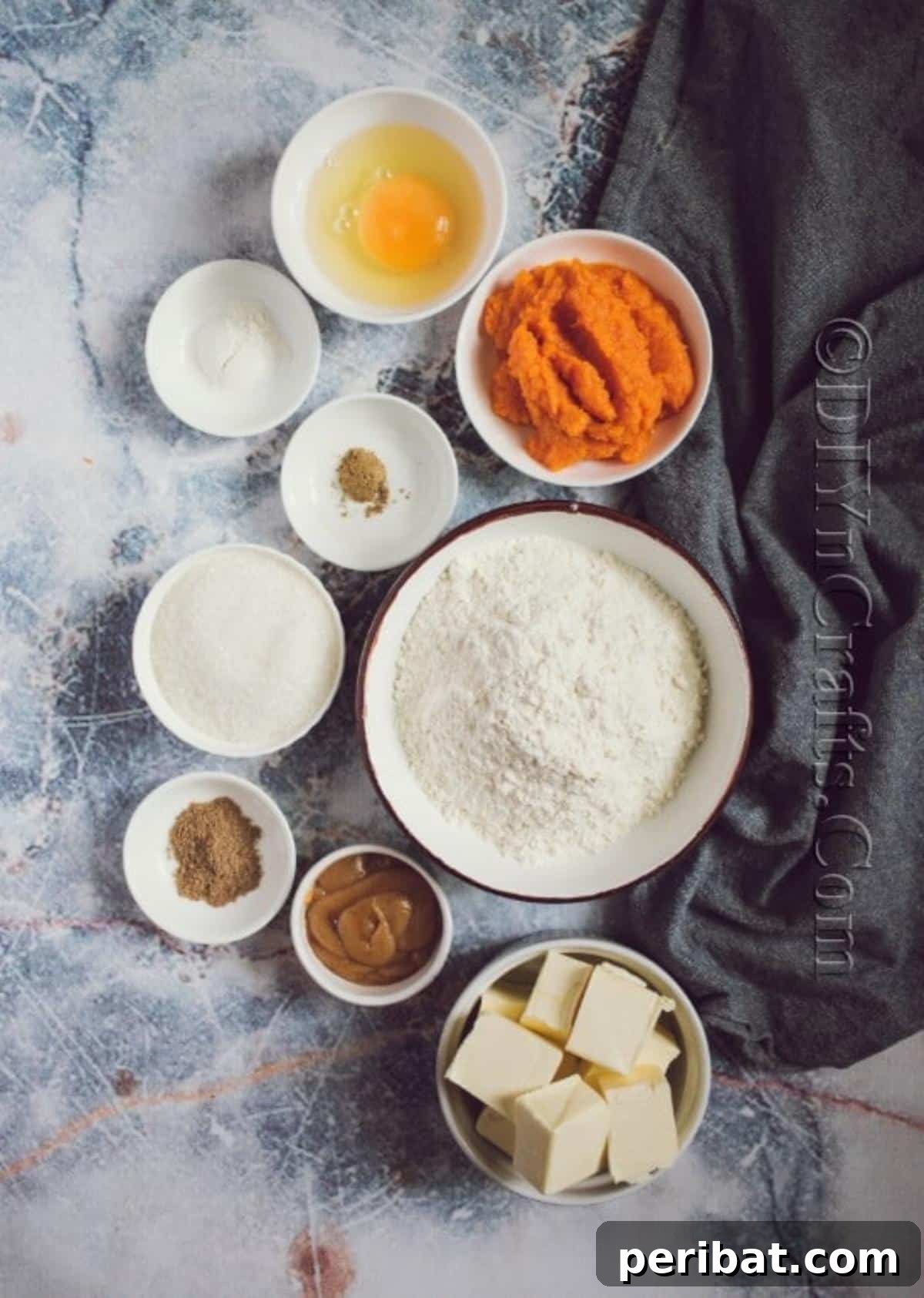 Cozy Fall Pumpkin Cookies Recipe 3 Gathering and sifting together the dry ingredients for the pumpkin cookie base: flour, baking powder, nutmeg, and cardamom.
