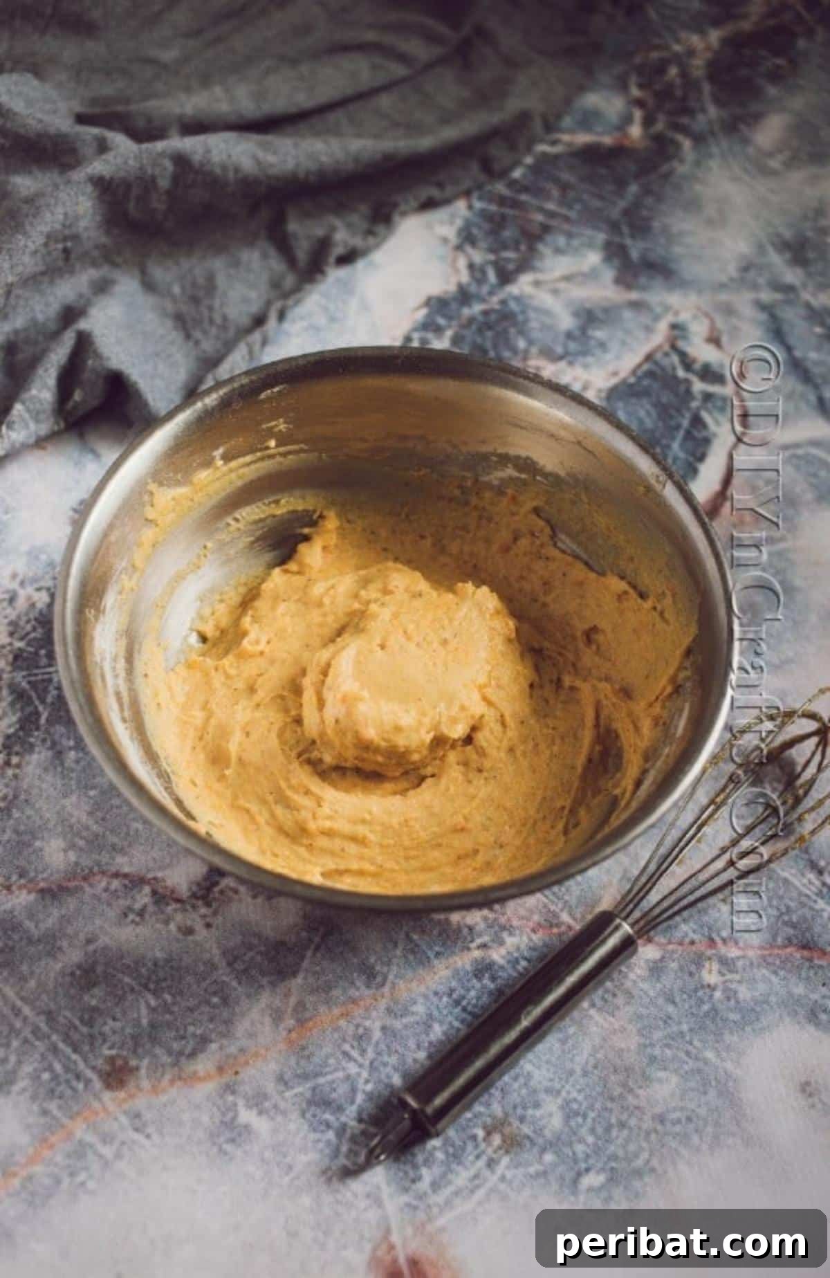 Cozy Fall Pumpkin Cookies Recipe 5 The combined pumpkin cookie dough, a smooth mixture ready for chilling to enhance flavor and texture.