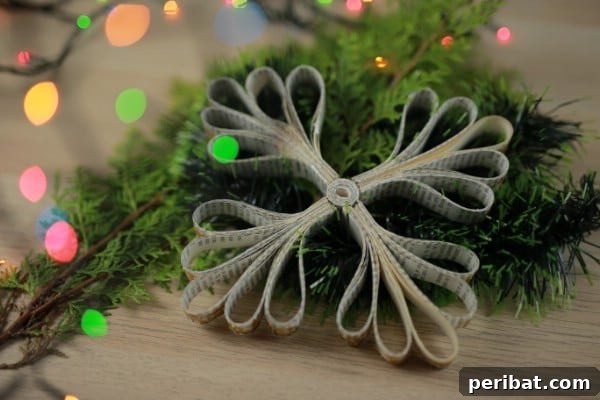 Beautifully crafted snowflake ornament made from the pages of an old book.