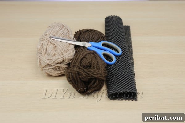 Beautiful DIY Pom Pom Rugs Made Easy 4 Wrapping yarn around hand for pom pom
