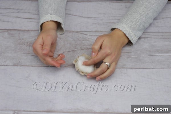 Craft Your Own Scandinavian Rice Sock Gnome 15 Another perspective of the partially stitched nose fabric