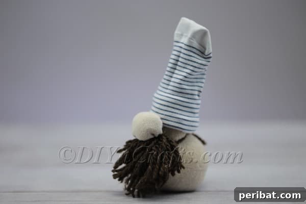 Craft Your Own Scandinavian Rice Sock Gnome 21 Another angle of the completed sock gnome, highlighting its festive and whimsical appearance