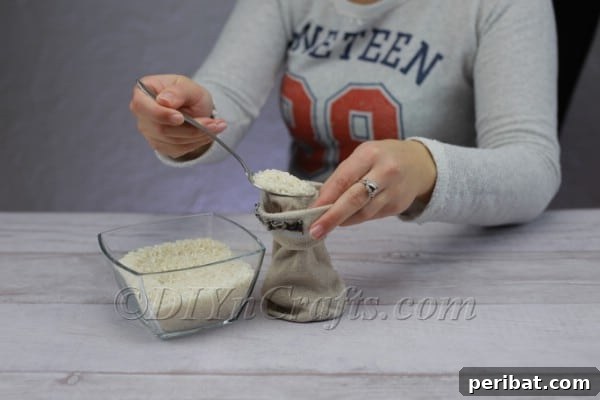 Craft Your Own Scandinavian Rice Sock Gnome 5 Filling a sock with rice to create the weighty body of the gnome