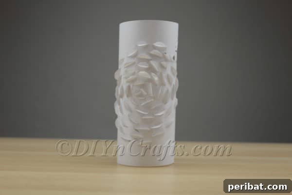 Handcraft a Luminous 3D Paper Lantern 10 Securing the paper to the jar with tape