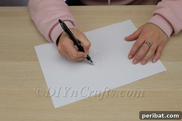 Handcraft a Luminous 3D Paper Lantern 3 Initial sketch of the flower pattern for the 3D paper lantern