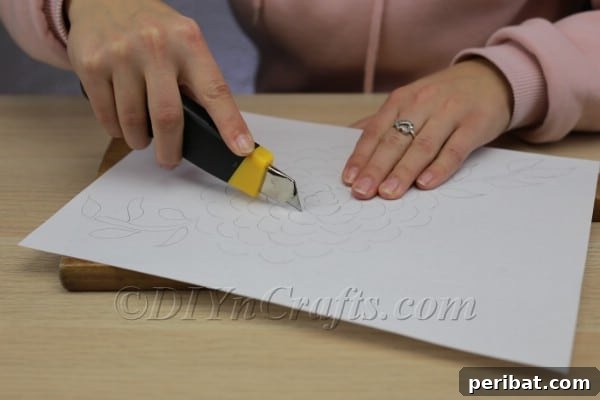 Handcraft a Luminous 3D Paper Lantern 5 Close-up of precision knife cutting the arcs for 3D effect
