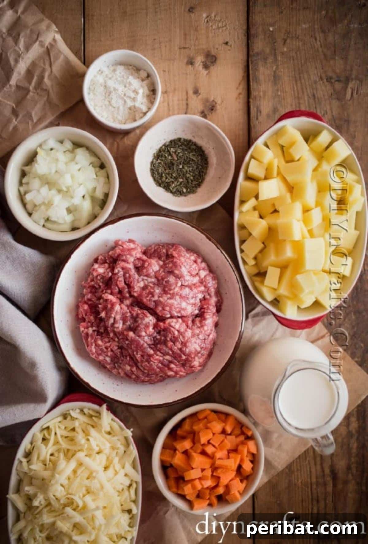 Hearty Family Cheeseburger Soup 3 Essential ingredients for a delicious cheeseburger soup, including fresh vegetables, ground beef, and shredded cheddar cheese.