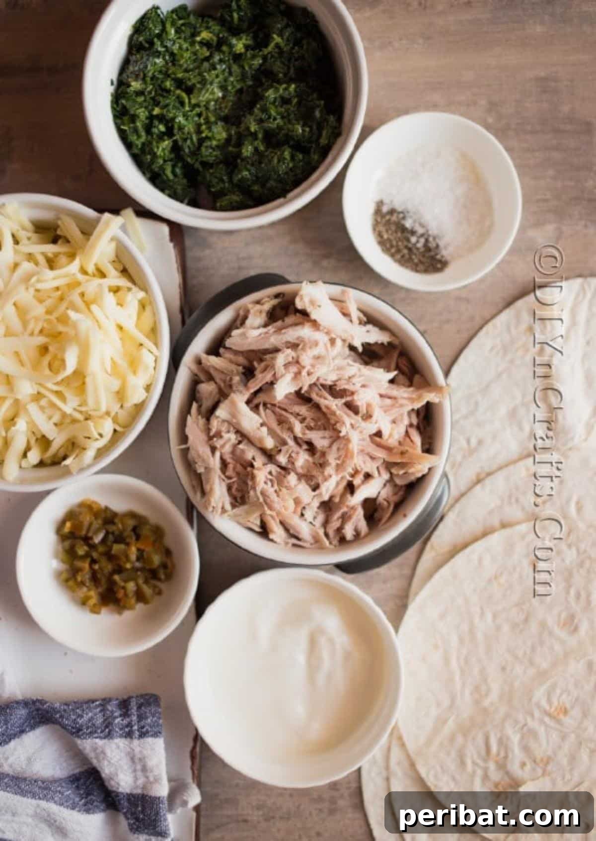 Effortless Crispy Chicken Taquitos 3 Ingredients for chicken taquitos laid out on a wooden surface