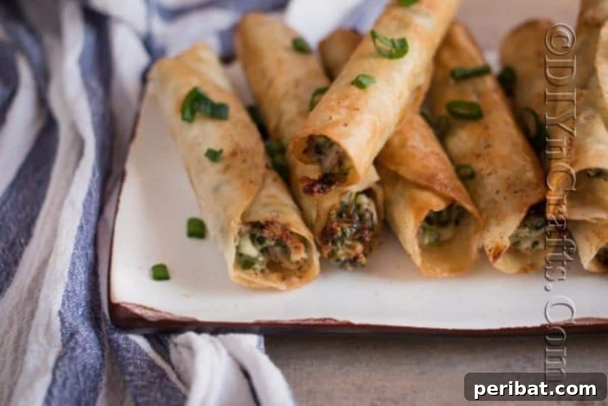 Effortless Crispy Chicken Taquitos 7 Finished Chicken Taquitos served with various dips