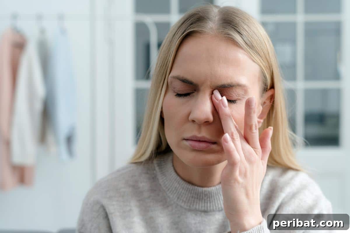 Beyond the Bin: 20 Brilliant Ways to Repurpose Fruit and Vegetable Peels 12 A woman with tired, sore eyes.