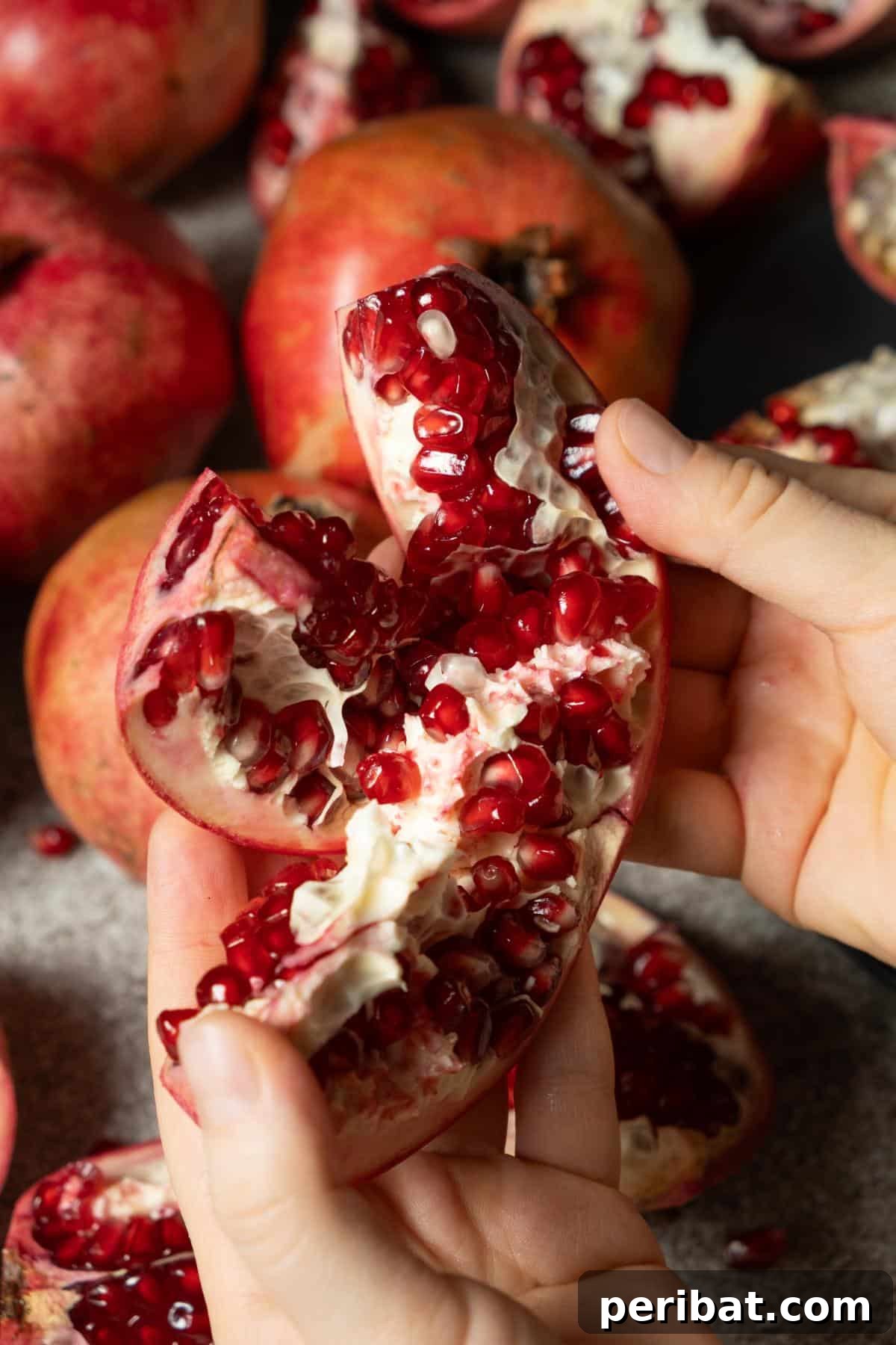 Beyond the Bin: 20 Brilliant Ways to Repurpose Fruit and Vegetable Peels 14 Peeling a pomegranate.