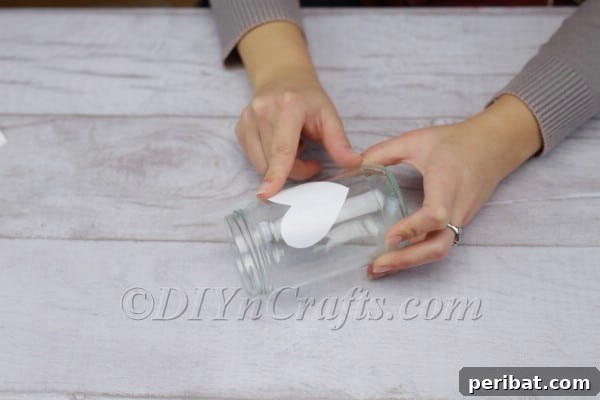 Spark Romance: Create Your Own Valentine Heart Lantern 8 Ensuring the edges of the paper heart are flat