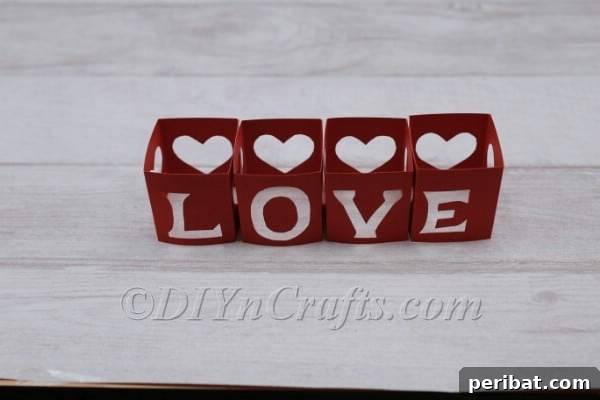 Arranging the 'LOVE' lantern cubes