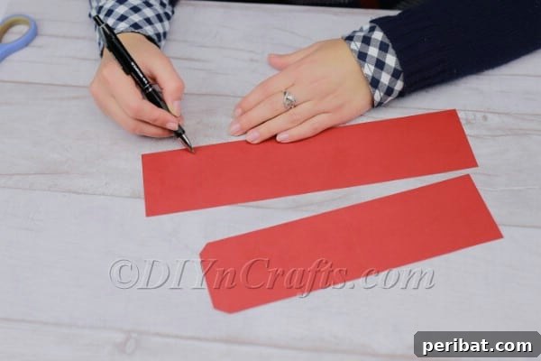 Folded paper strip showing tab