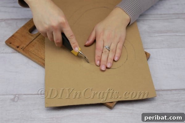 Cutting the cardboard heart