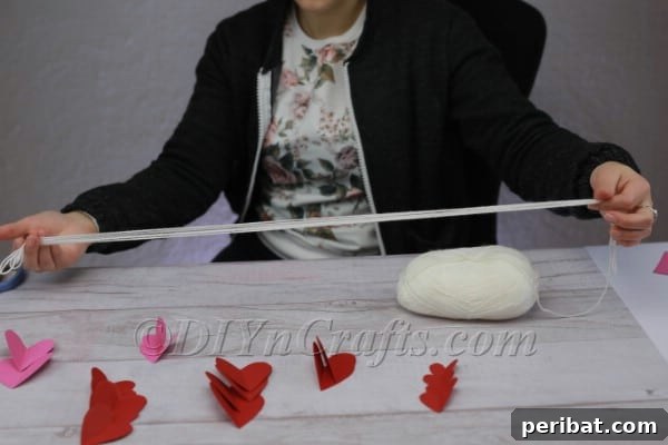 Measuring and cutting thread for heart garlands