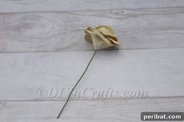 Literary Blooms: Crafting a Heartfelt Book Bouquet 15 First completed paper rose from book pages, showcasing detailed craftsmanship