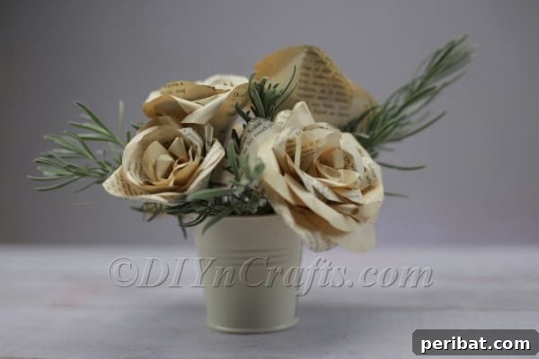 Literary Blooms: Crafting a Heartfelt Book Bouquet 17 Finished book page rose bouquet displayed in a vase