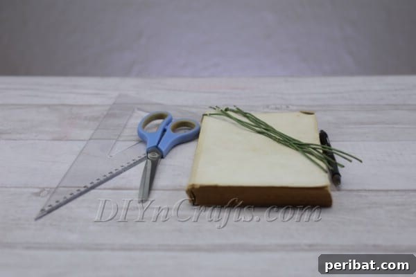 Literary Blooms: Crafting a Heartfelt Book Bouquet 4 Tearing pages from an old book for paper rose craft