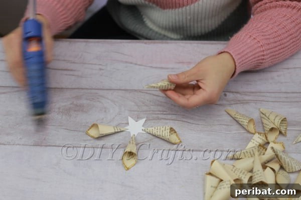 Attaching a petal to a star point.