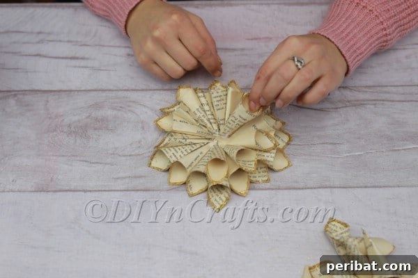 Second layer of petals being added.