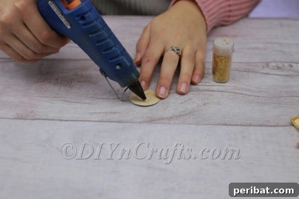 Applying glue to the centerpiece.