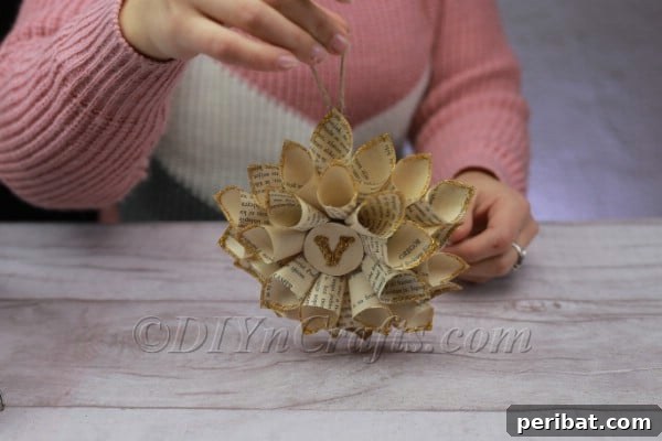 Attaching the centerpiece to the flower.