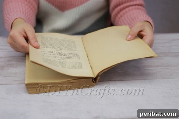 Measuring book pages for cutting.