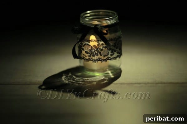 Craft a Charming Lace Lantern Effortlessly 12 Close-up of a lace jar lantern used as elegant table decor, showcasing its delicate design